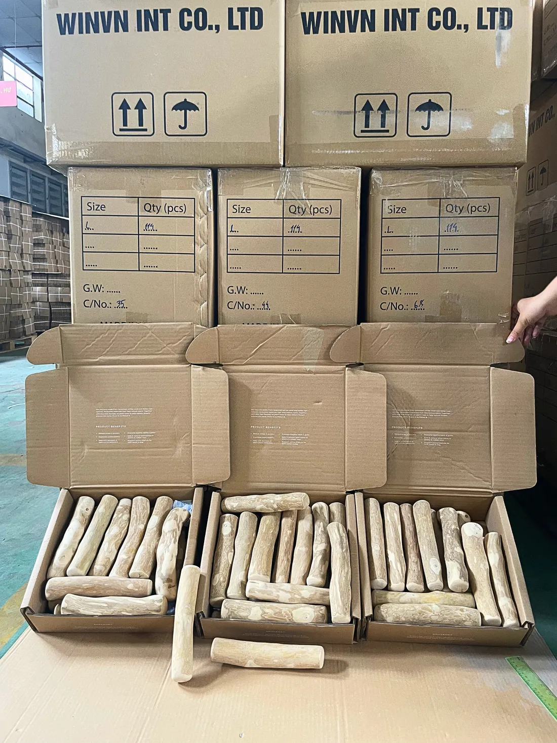 Loose coffee wood chew sticks packed into a WINVN INT master carton