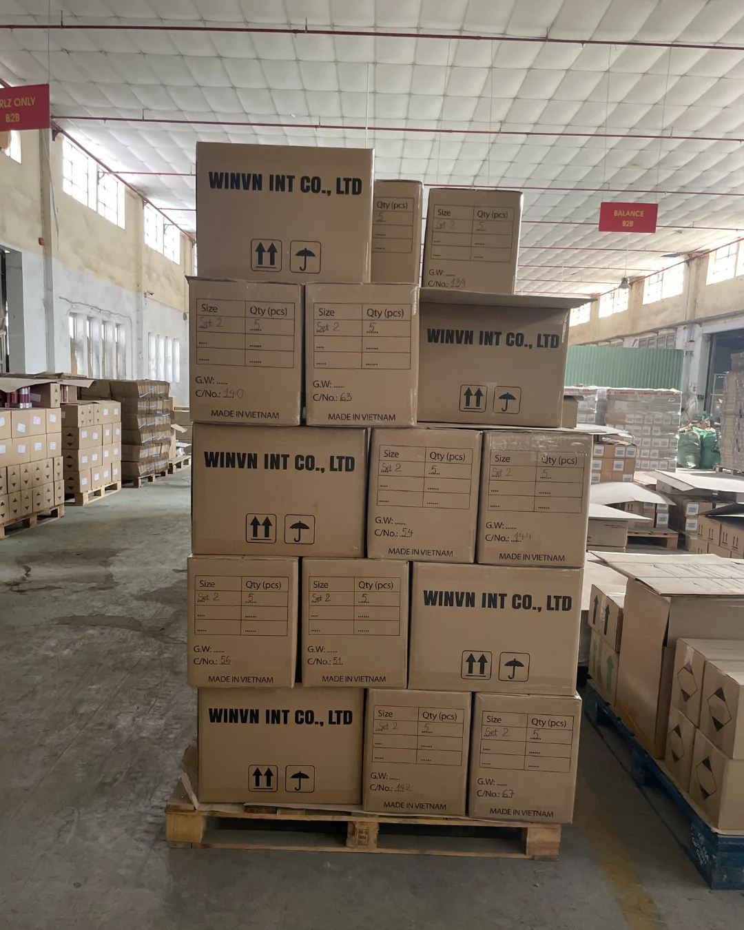 WINVN INT master cartons stacked on a pallet in the warehouse