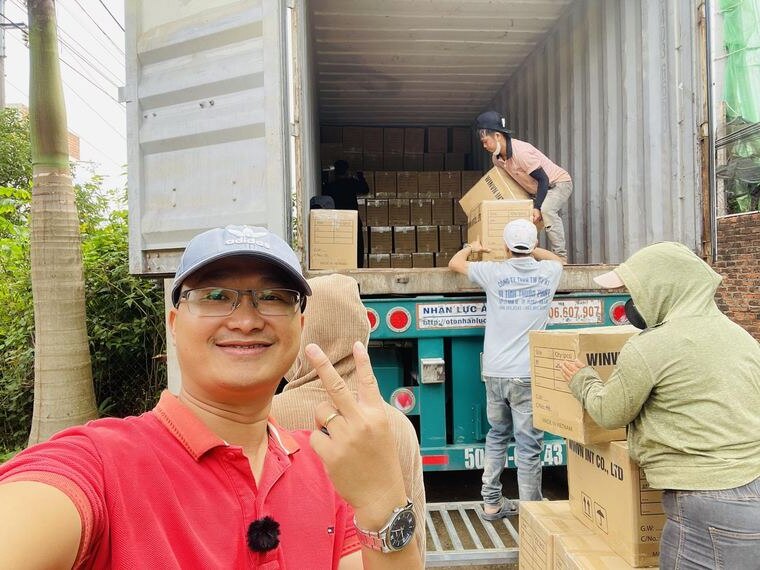 Mark Ton with the loading crew at an export container in Ho Chi Minh City