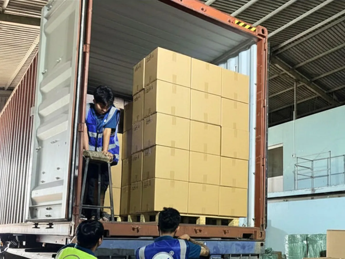 A pallet of packed coffee wood chews going into an export container